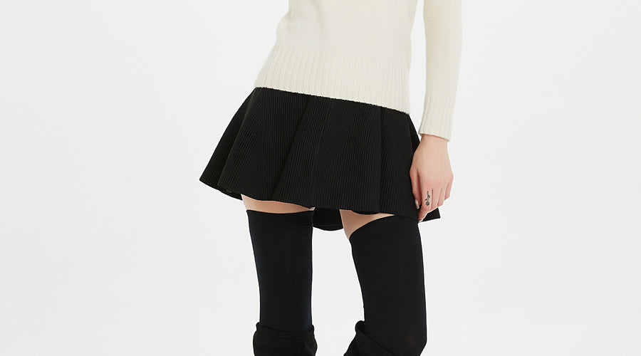These thigh high socks aren't super thick, but they've held up in the wash thus far.