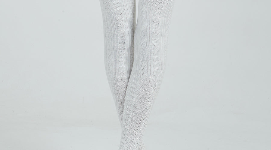 Why don't thigh high socks wear too high?