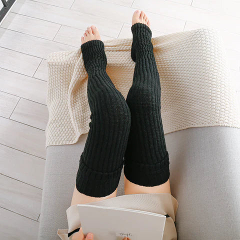 Why do longer leg warmers have an advantage?