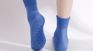 I wear a US woman's shoe size 11 wide, these grip socks fit just right!